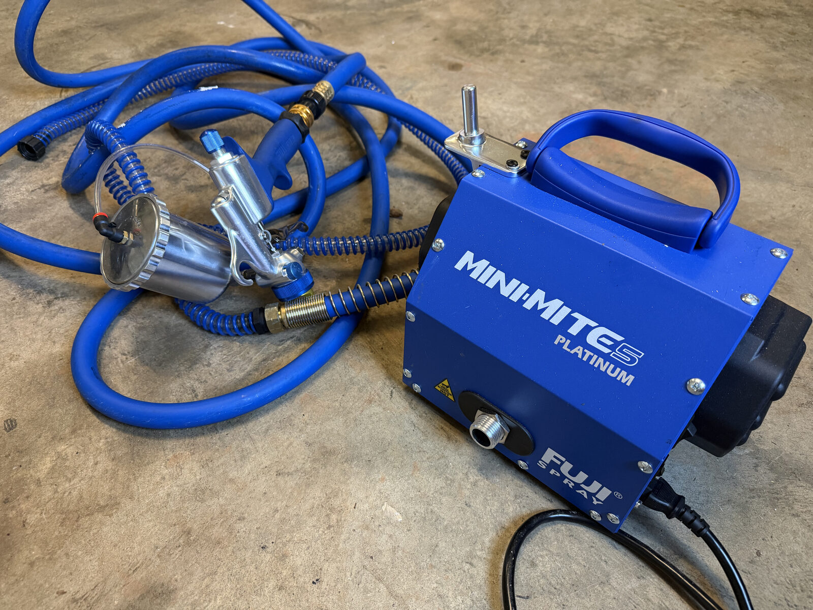 HVLP spray rig used for applying Everbrite coating