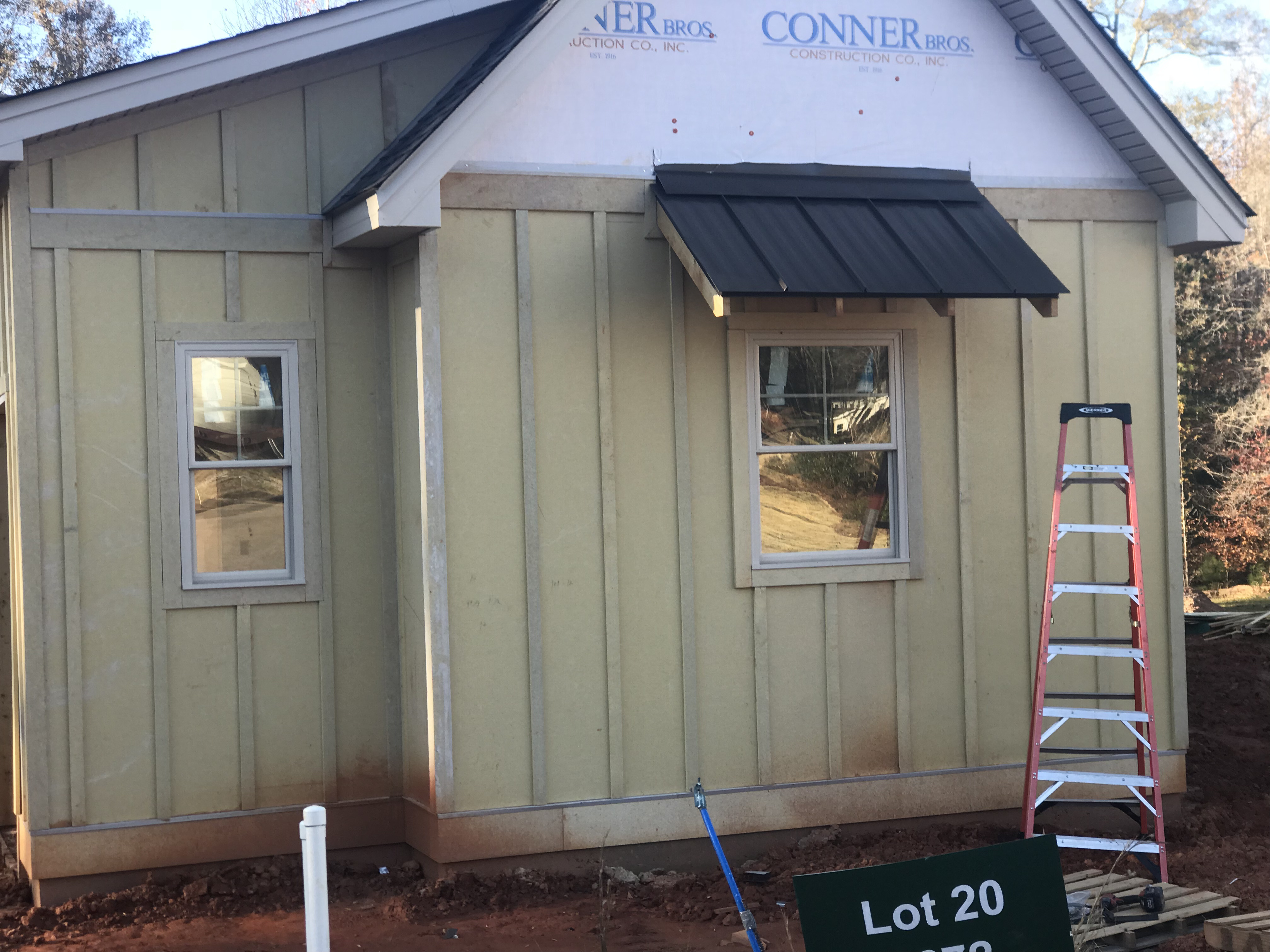 Standing seam shed roof with clean eave and rake