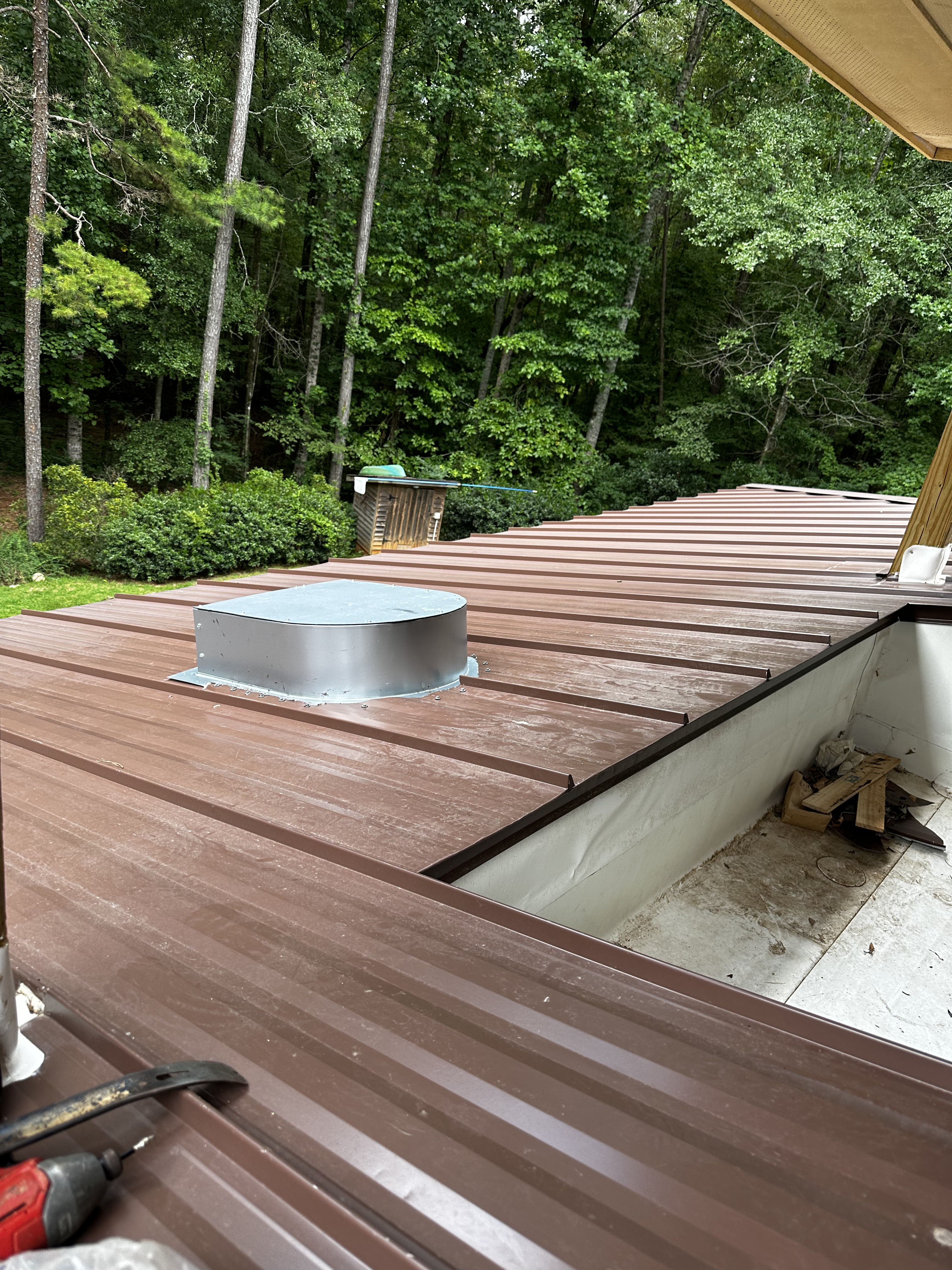 Architectural shingles tie-in with low-slope membrane and metal LaGrange GA