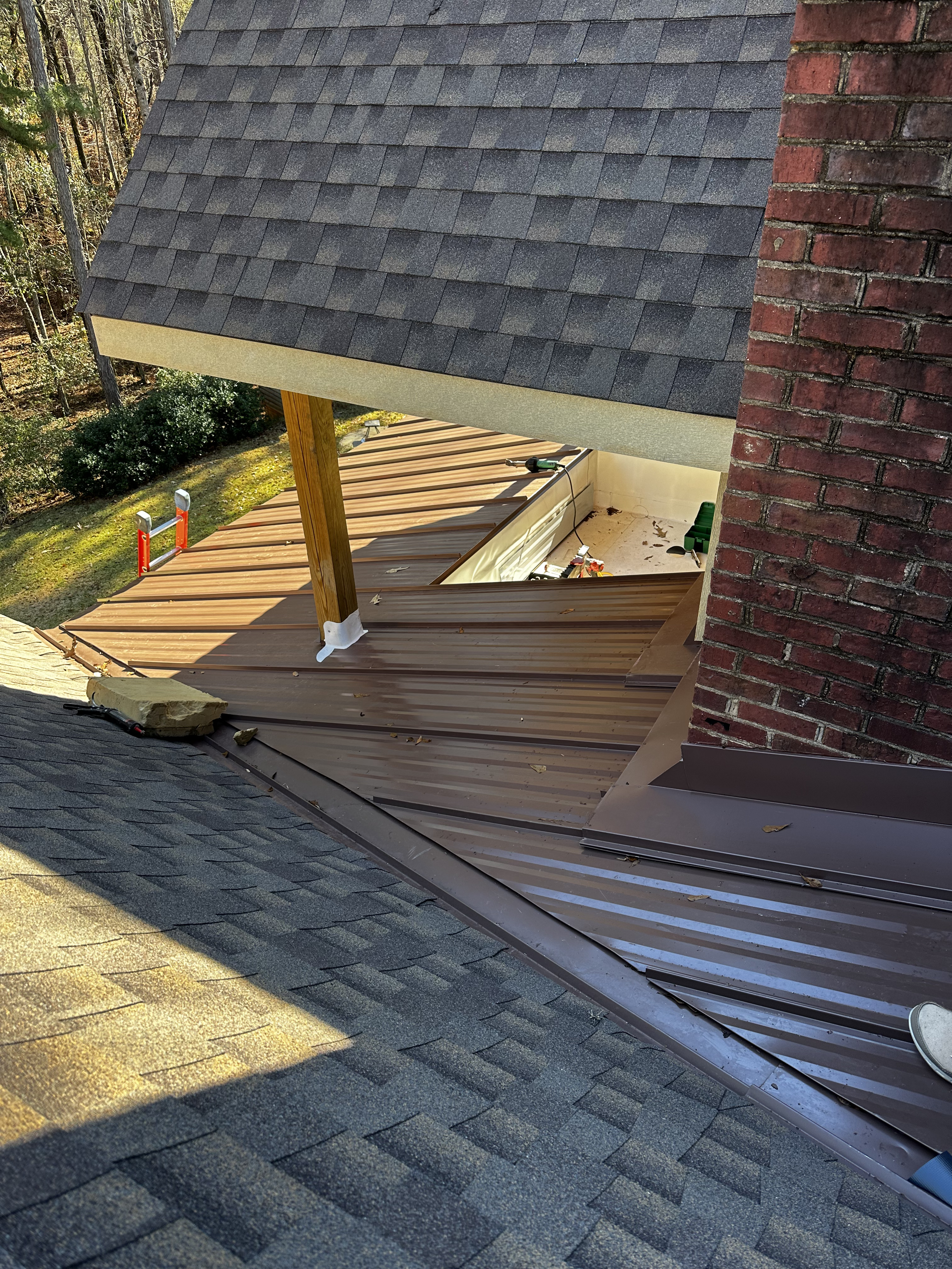 Architectural shingles tie-in with low-slope membrane and metal LaGrange GA