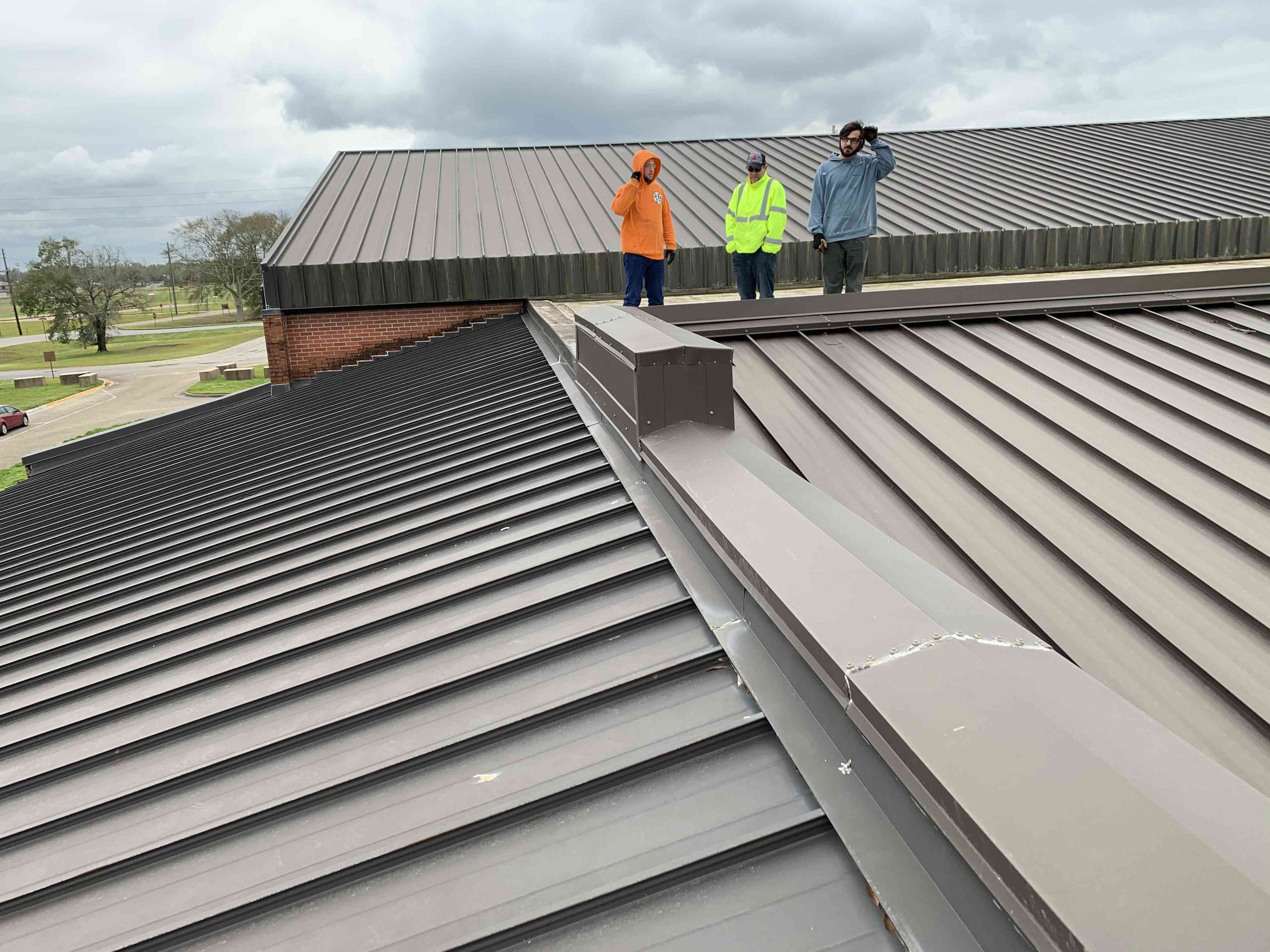 Wide view of Fort Rucker gym/daycare roof recover