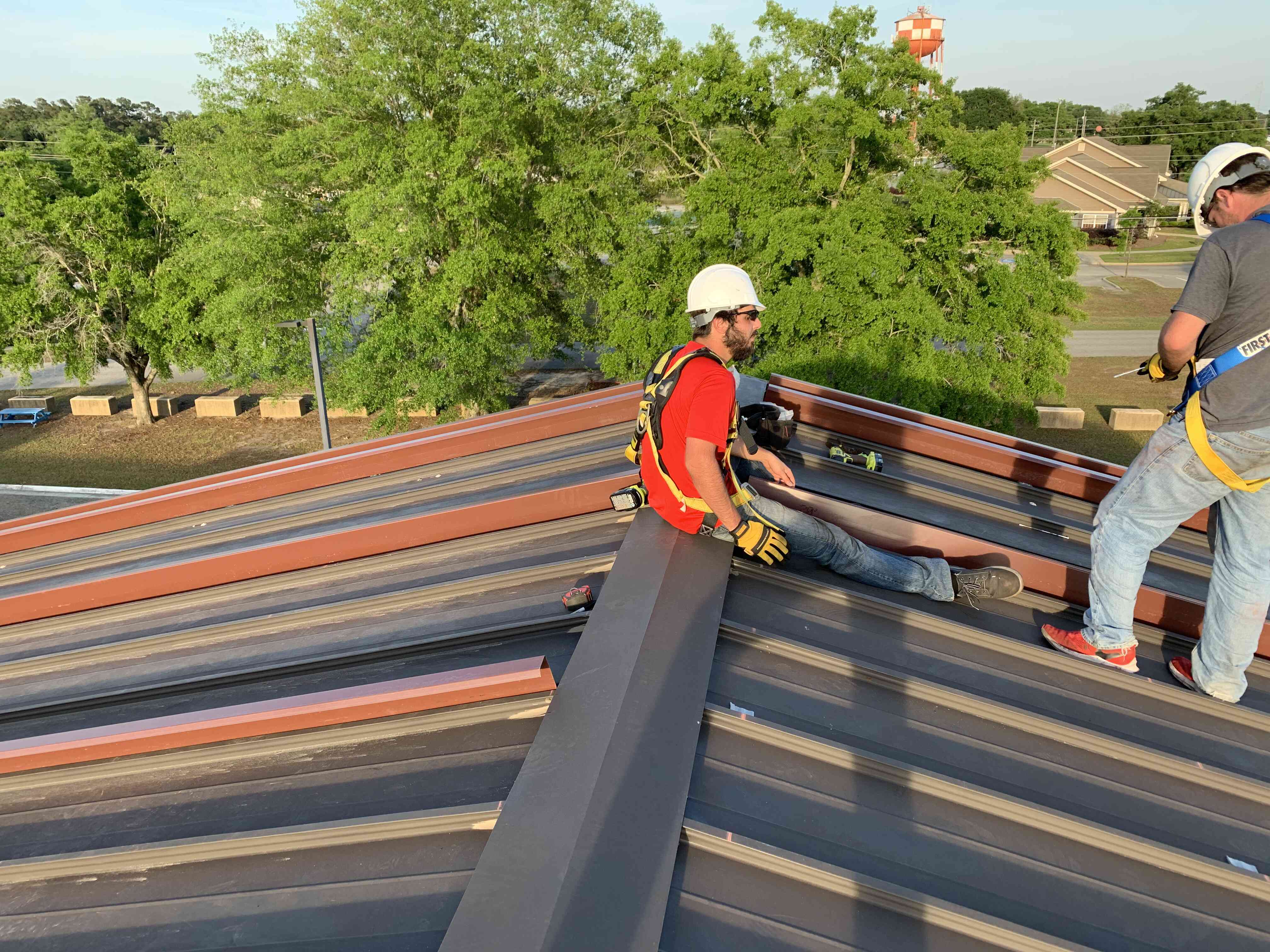 Flat roof tie-in under new metal shell at Fort Rucker