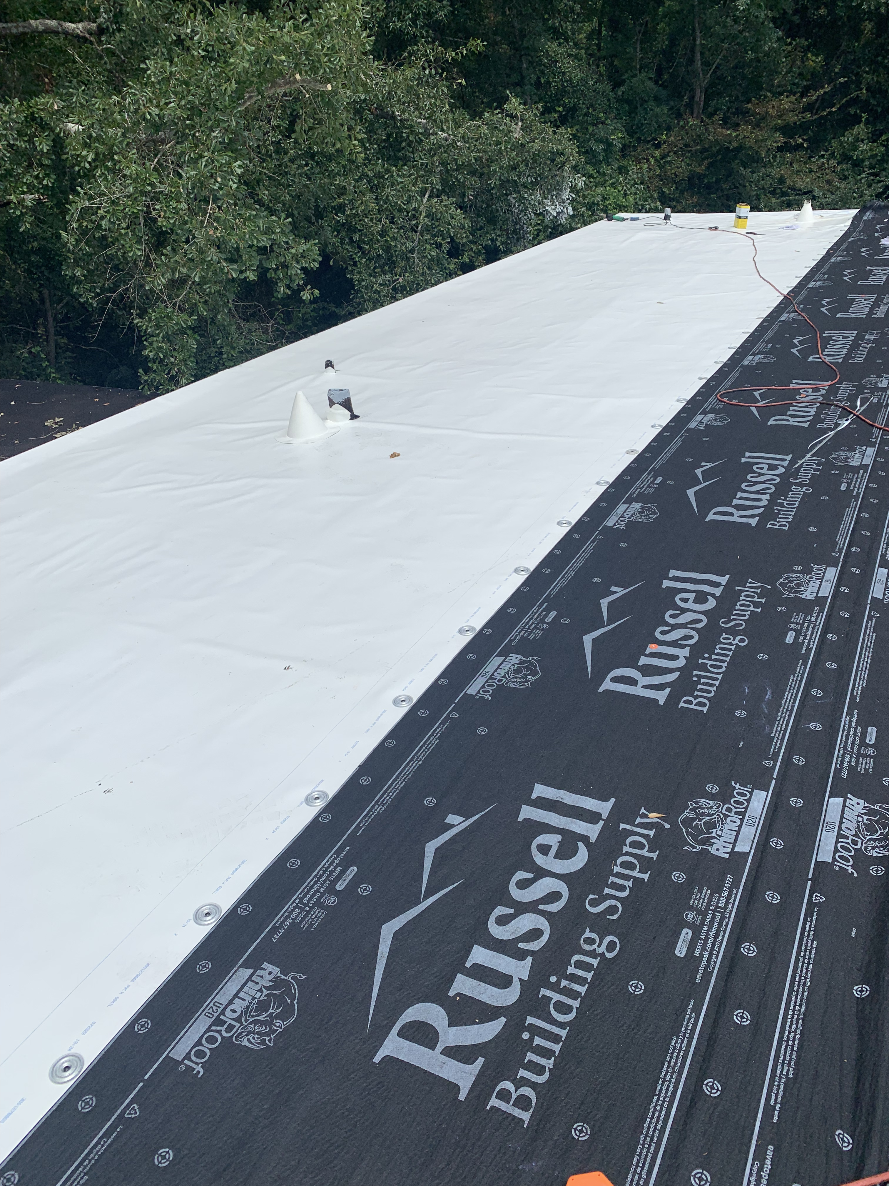 White PVC membrane with welded seams and edges