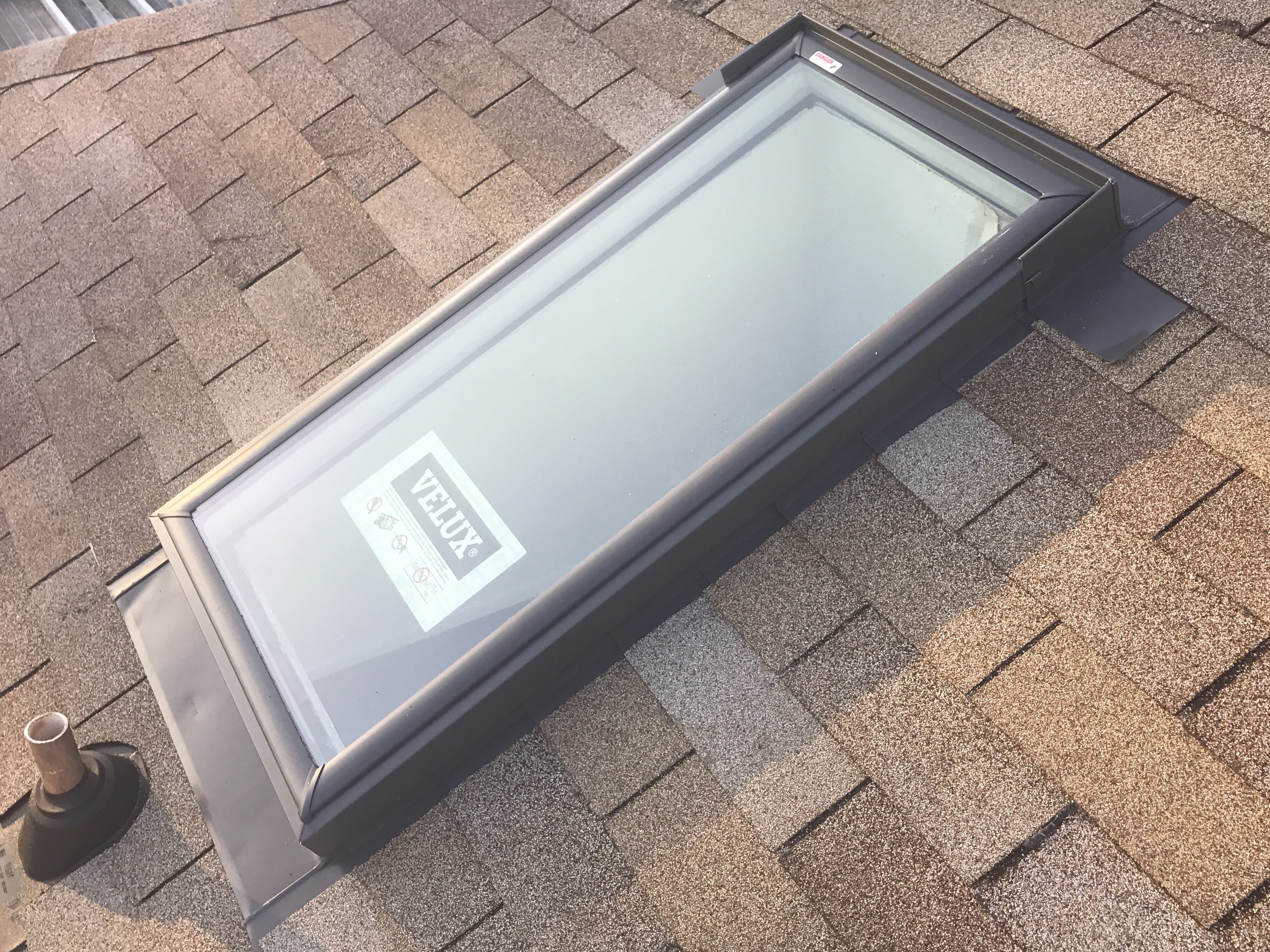 Velux skylight installed on shingle roof auburn