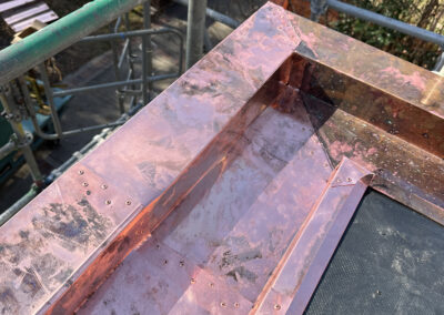 Copper Gutters Assembled, Fluxed, and Riveted